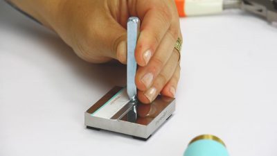 holding design stamp flush