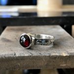 cabochon ring on table