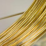 silver sheet and gold wire
