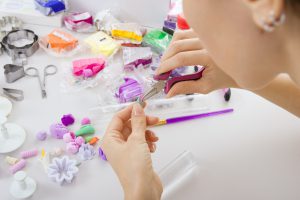 Someone making jewellery at home