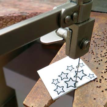 cutting out starry drop earrings