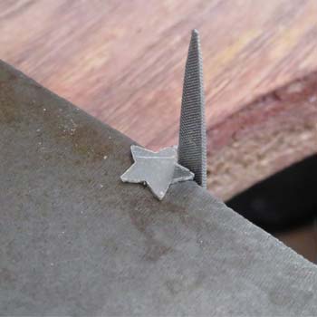 filing dangle star earrings