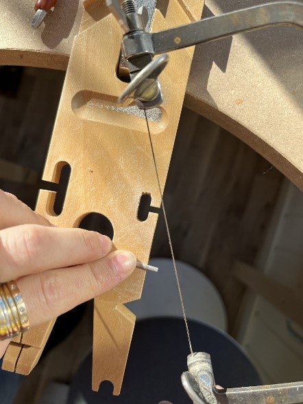 Use a piercing saw to cut your ring to size