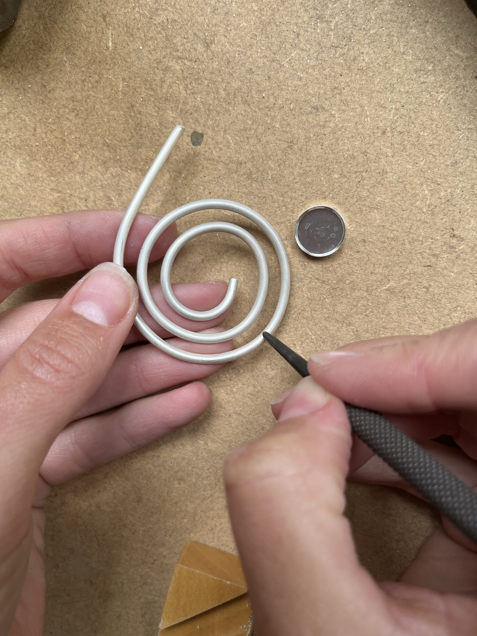 Mark off excess wire using a pen