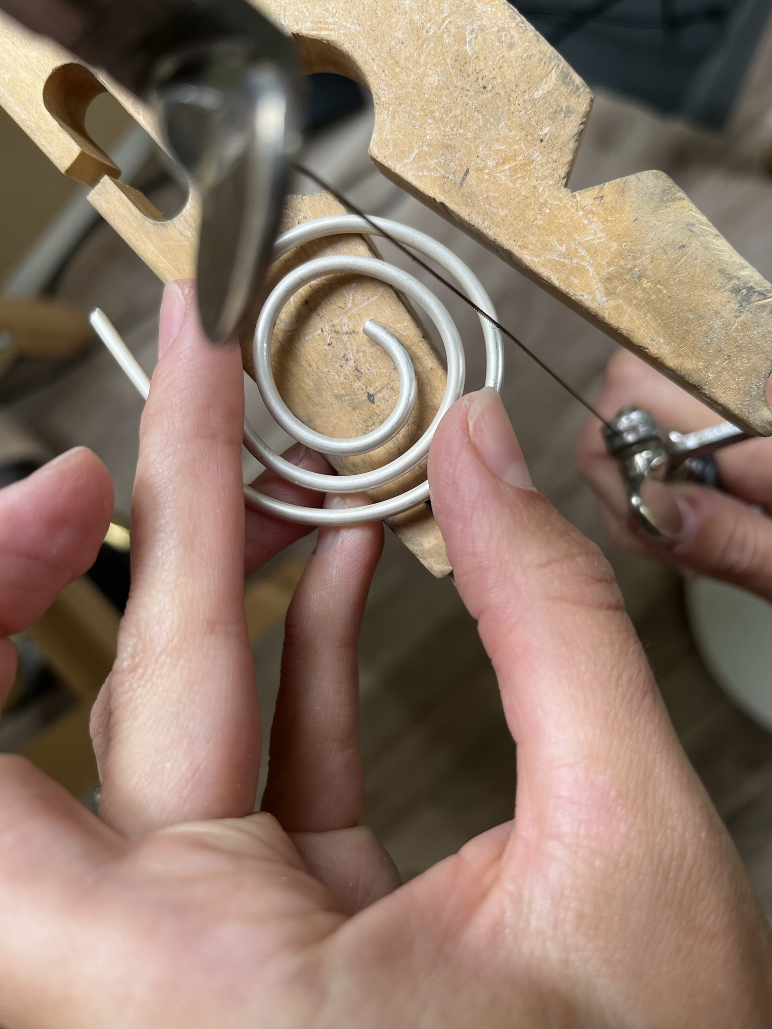 Cut off excess wire using a piercing saw