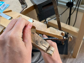 Cut the disc in half using a piercing saw