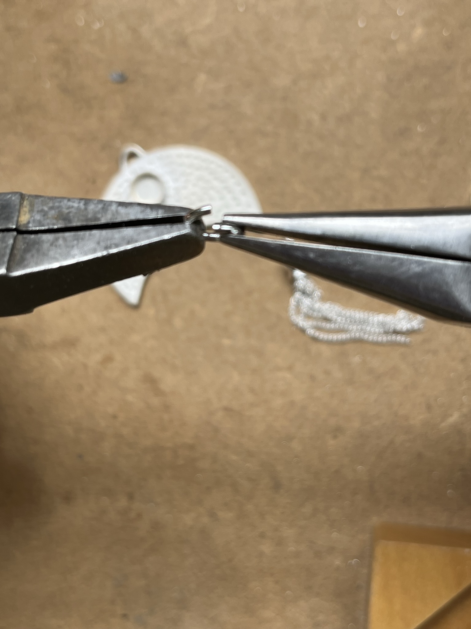 Open jump ring with pliers