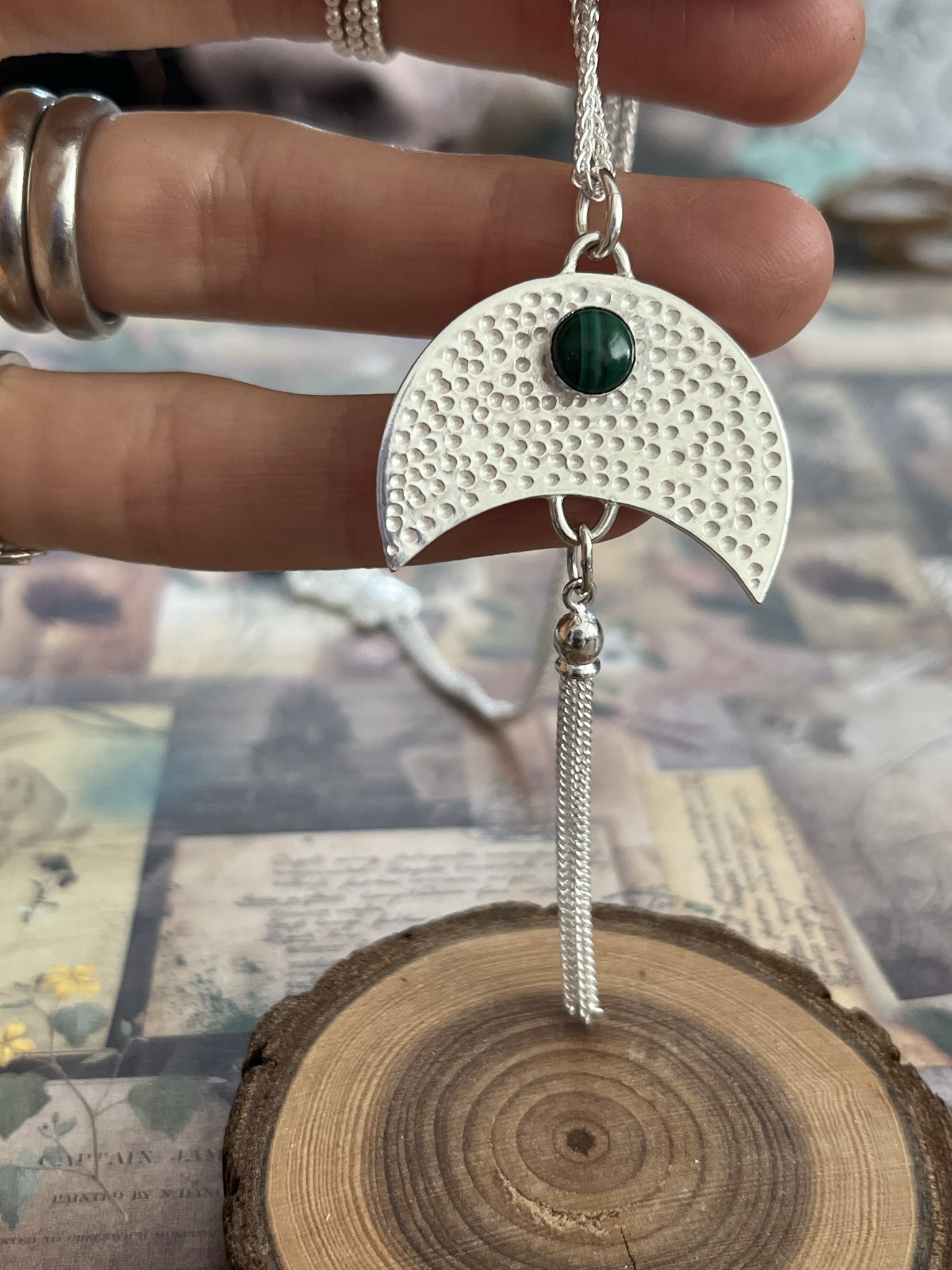 Showing off finished silver pendant