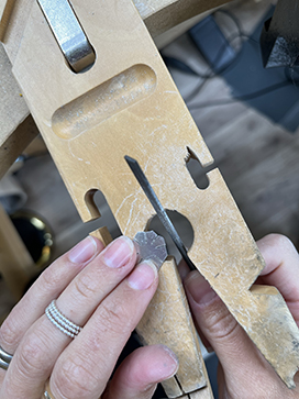 Use a flat file to round off the pointy edges