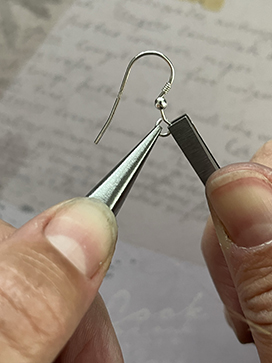 Open hoop on hook wire using pliers