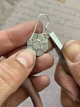 Attach hook wire to flower