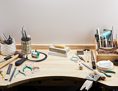 jewellers workbench with jewellery making tools 