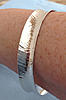 Click image for larger version. 

Name:	Bangle - chevron hammered anticlastic.jpg 
Views:	10 
Size:	58.4 KB 
ID:	5918